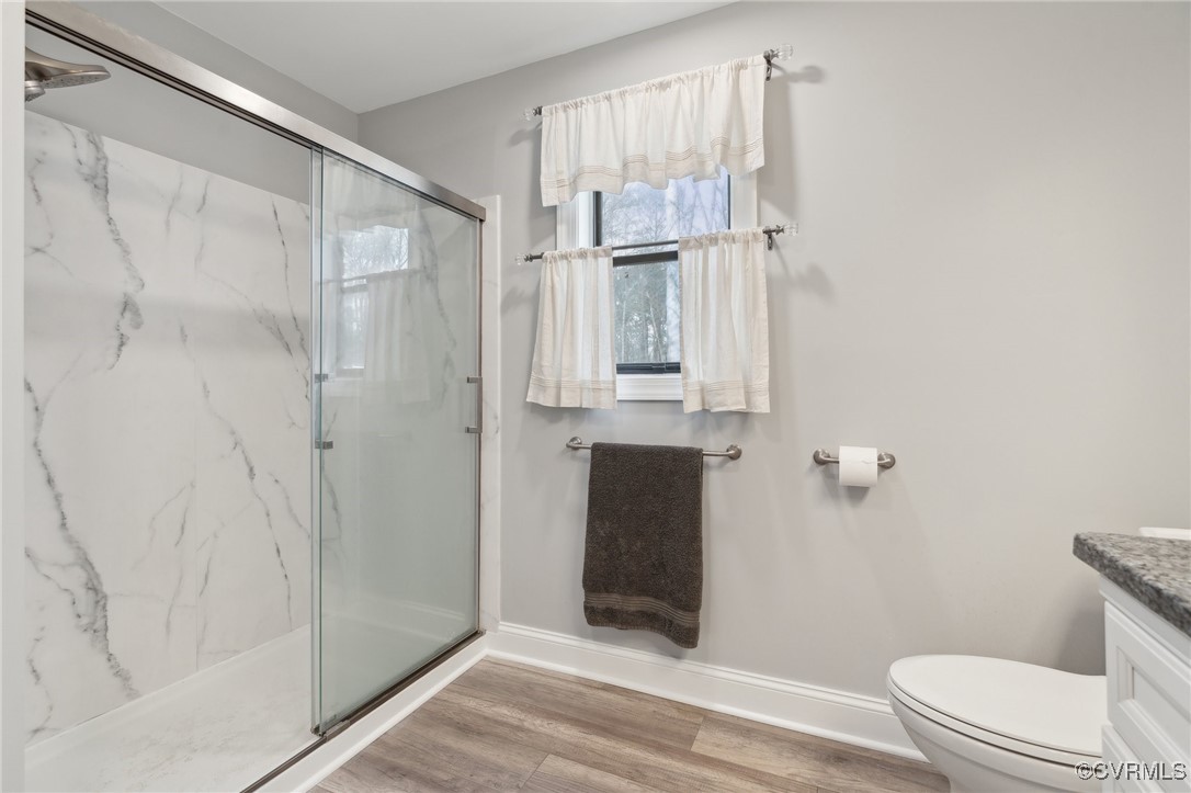 17830 Stage Road Barhamsville, VA 23011 - Photo 27 of 48 Full bath featuring vanity, wood finished floors,