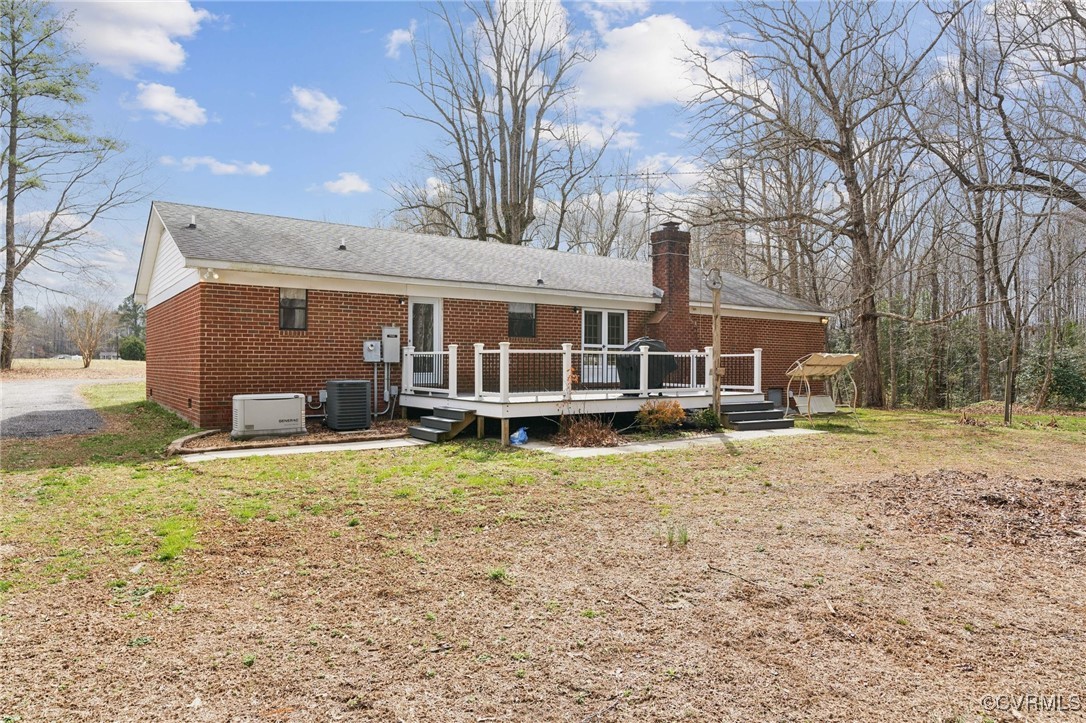 17830 Stage Road Barhamsville, VA 23011 - Photo 35 of 48 Rear view of house with cooling unit, brick siding