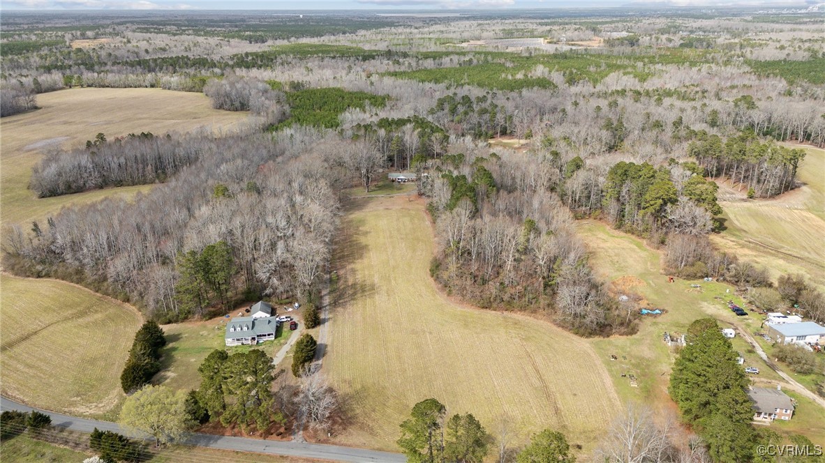 17830 Stage Road Barhamsville, VA 23011 - Photo 39 of 48 Bird's eye view featuring a rural view and a woode