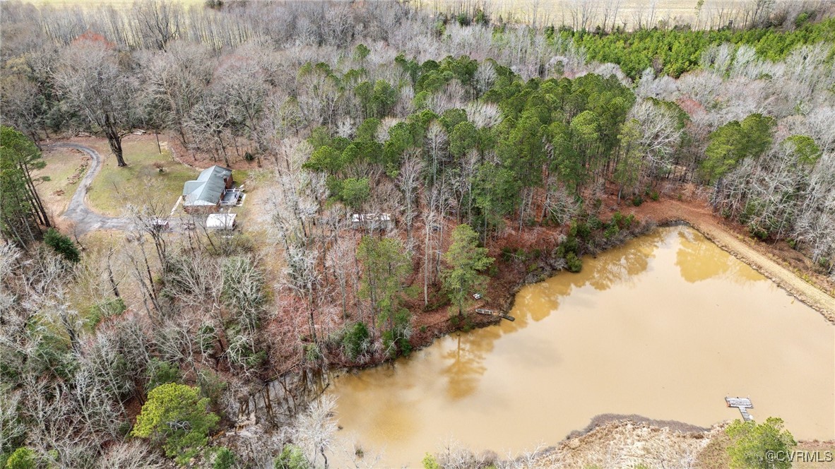 17830 Stage Road Barhamsville, VA 23011 - Photo 44 of 48 Aerial view featuring a wooded view and a water vi