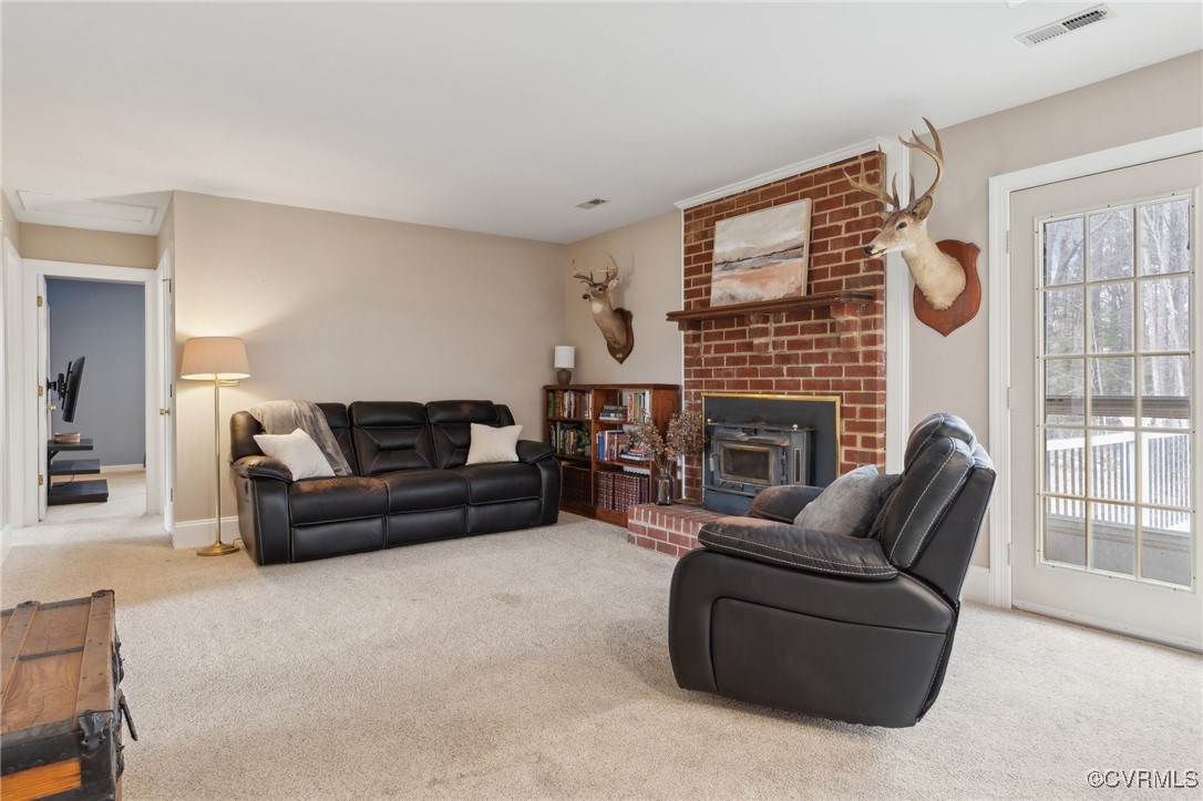 17830 Stage Road Barhamsville, VA 23011 - Photo 10 of 48 Living room featuring visible vents, carpet floori
