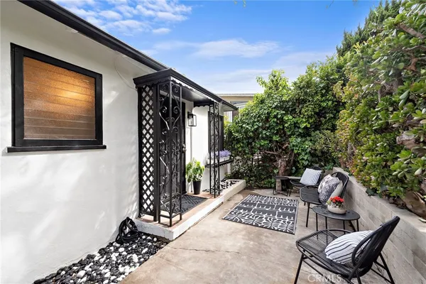 a balcony view with a garden