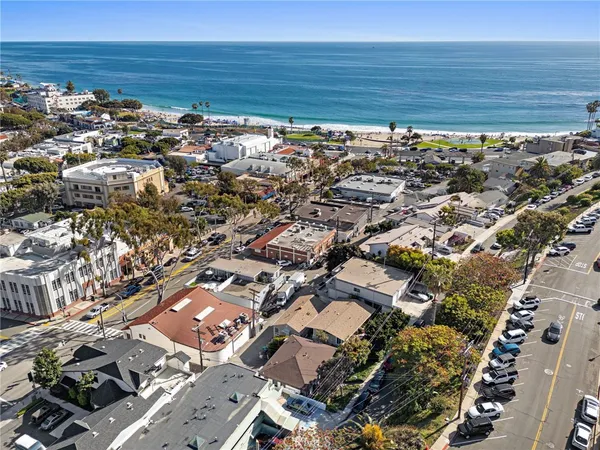 a kitchen with a stove and a refrigerator