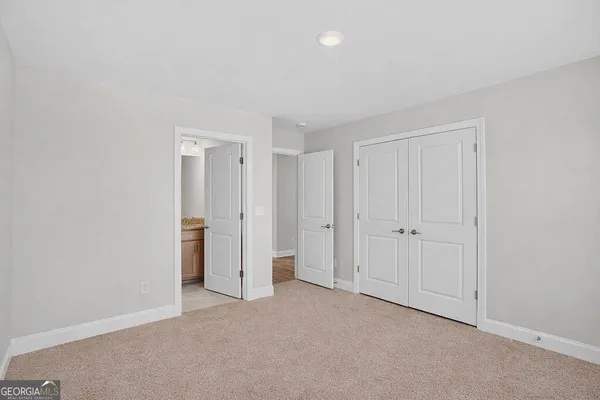 a spacious bathroom with a bathtub and a shower