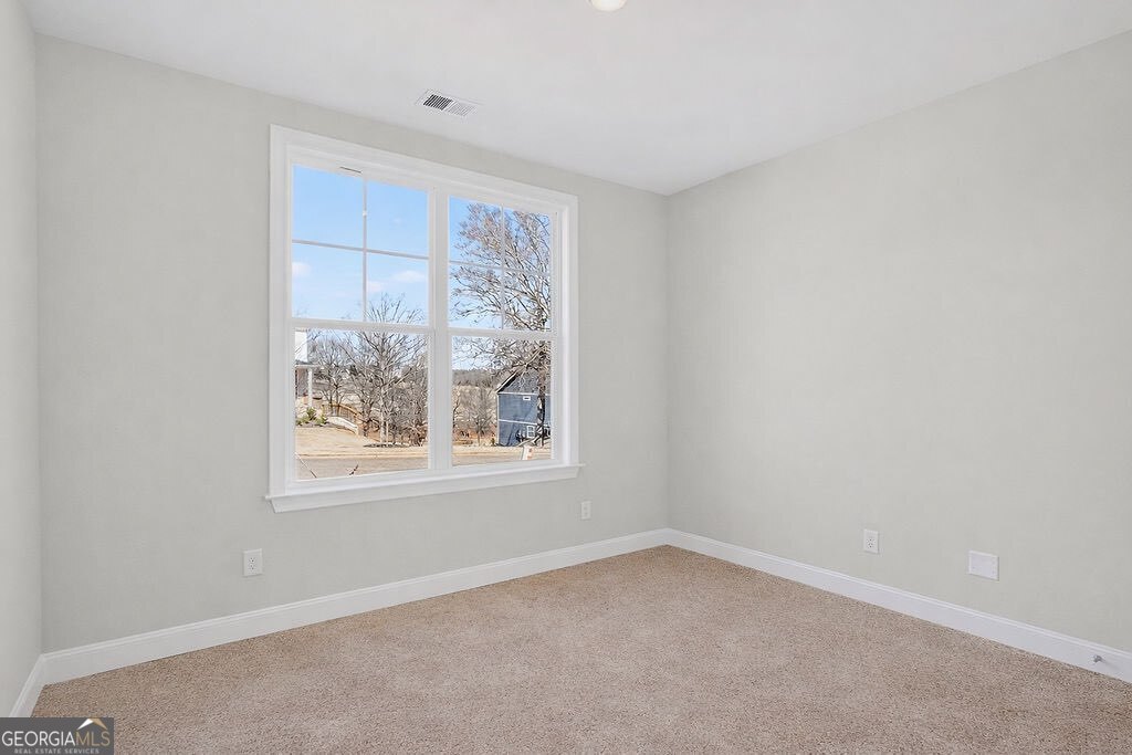 152 Classic Overlook Homer, GA 30547 - Photo 25 of 36 an empty room with a window