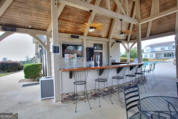 a view of a city street with a house