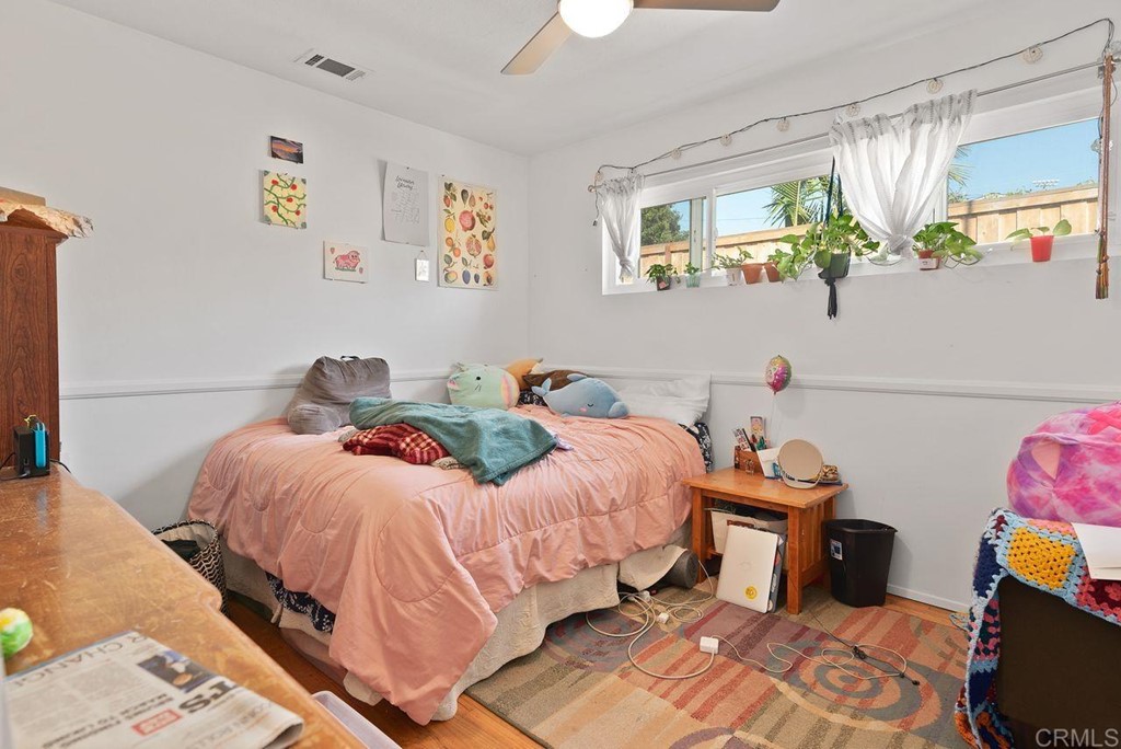 3255 Canyon Street Carlsbad, CA 92008 - Photo 28 of 33 a bedroom with a bed and a window