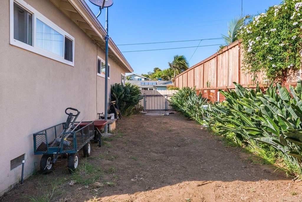 3255 Canyon Street Carlsbad, CA 92008 - Photo 33 of 33 a view of a backyard with sitting area and entertaining space