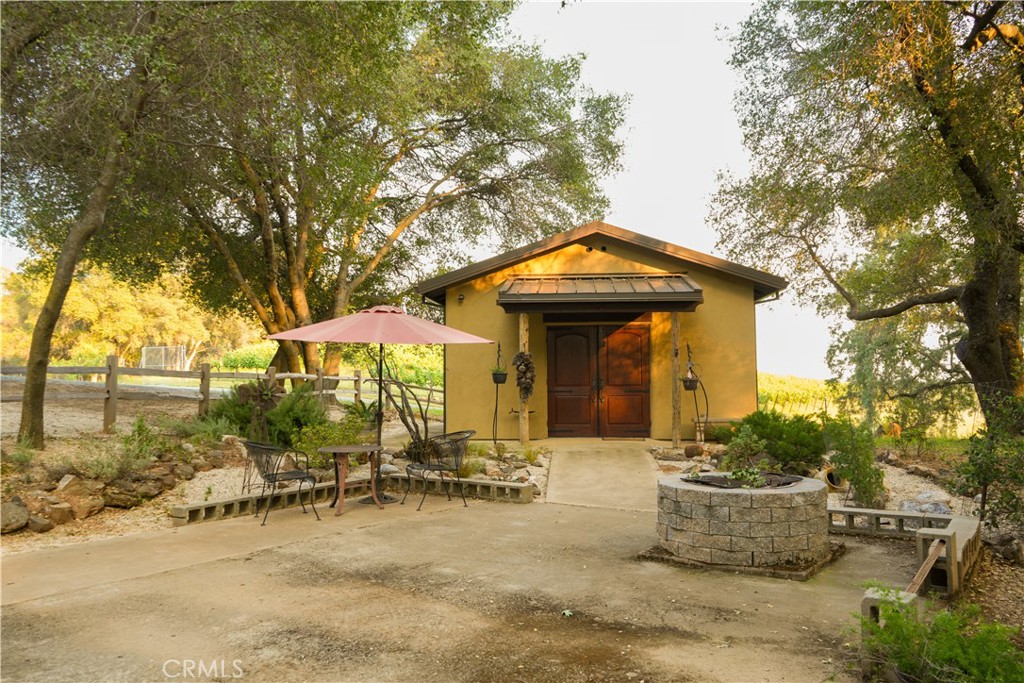 15000 Tyler Road Fiddletown, CA 95629 - Photo 25 of 32 an outdoor space with swimming pool and furniture