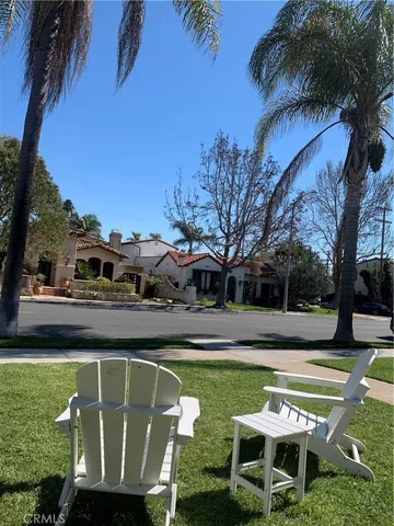 an aerial view of a house with a lake view