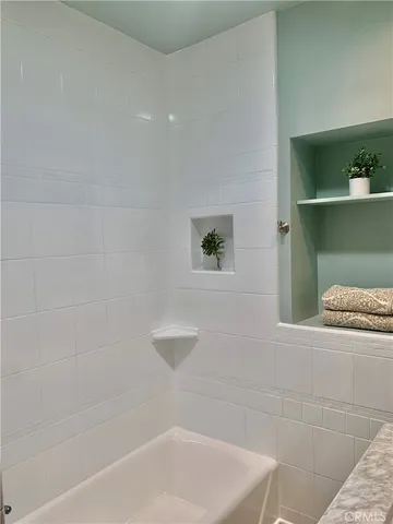 a bathroom with a bathtub