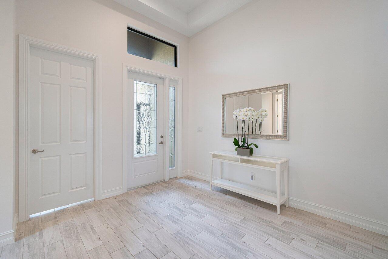 11856 Leon Circle Parkland, FL 33076 - Photo 2 of 43 a view of an empty room and window