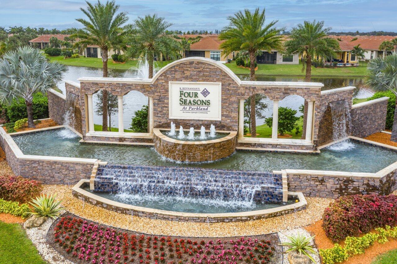 11856 Leon Circle Parkland, FL 33076 - Photo 34 of 43 a view of outdoor space swimming pool and green space