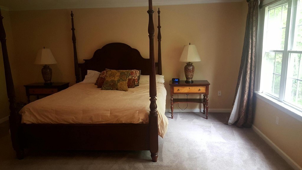 53 Hardwick Road Ashland, MA 01721 - Photo 14 of 18 a bedroom with a bed and a window