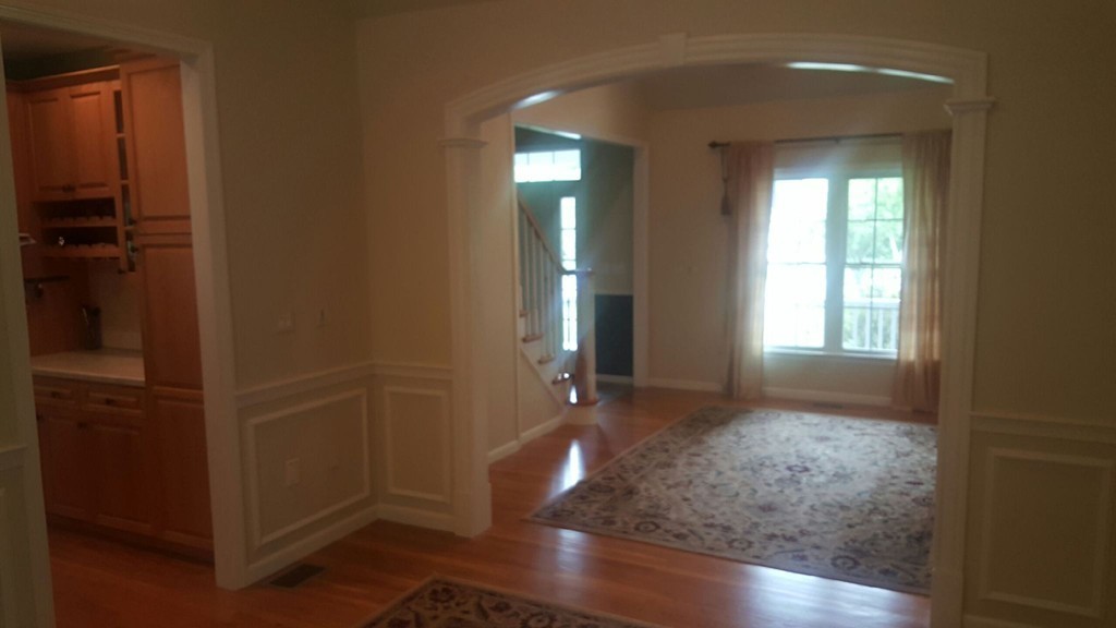 53 Hardwick Road Ashland, MA 01721 - Photo 9 of 18 a view of empty room with wooden floor and fan
