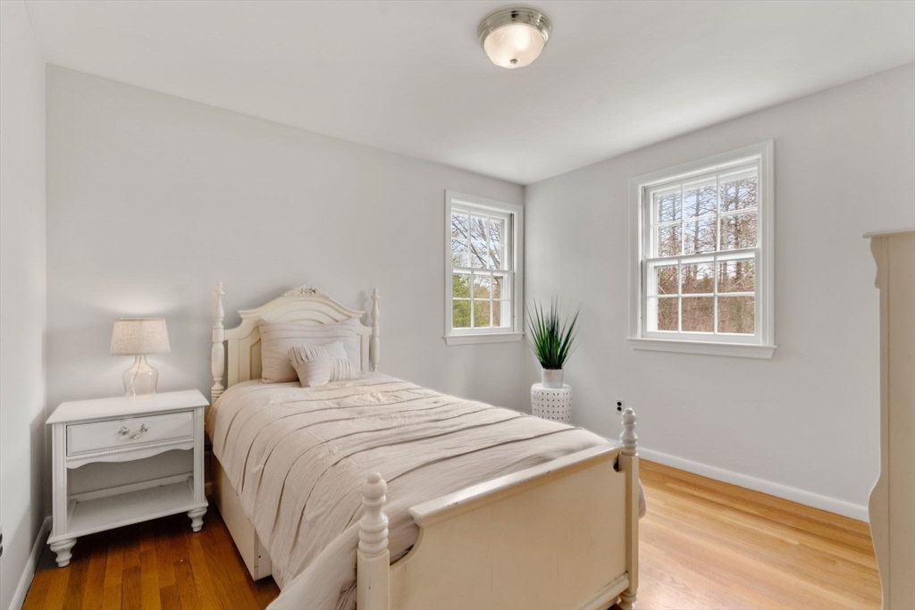 79 Oxbow Road Wayland, MA 01778 - Photo 15 of 30 a bedroom with a bed and a window