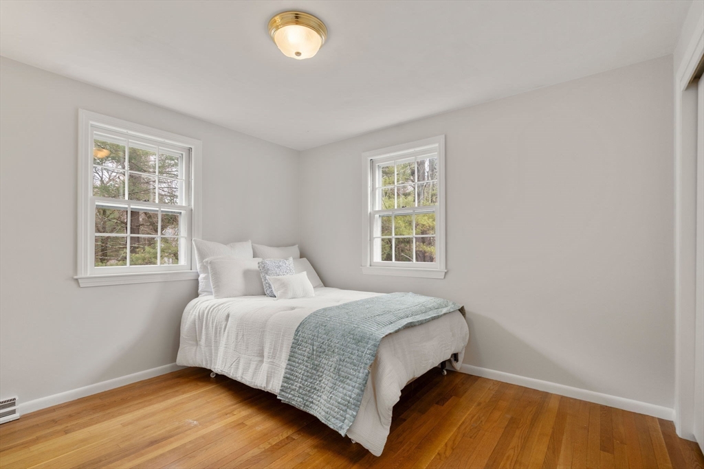 79 Oxbow Road Wayland, MA 01778 - Photo 16 of 30 a bedroom with a bed and a window
