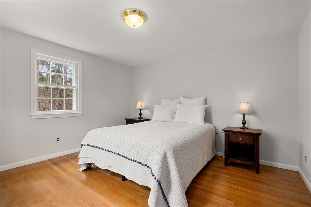 79 Oxbow Road Wayland, MA 01778 - Photo 20 of 30 a bedroom with a bed and a window