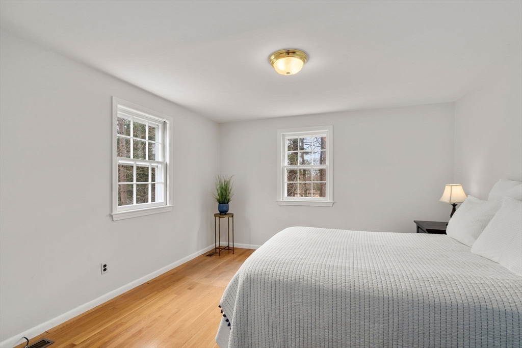 79 Oxbow Road Wayland, MA 01778 - Photo 21 of 30 a bedroom with a bed and a window