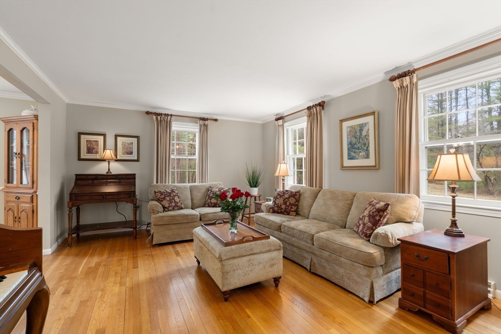 79 Oxbow Road Wayland, MA 01778 - Photo 6 of 30 a living room with furniture and a wooden floor