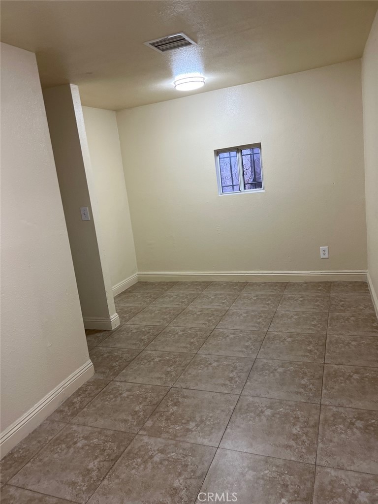 10529 Grape Street Los Angeles, CA 90002 - Photo 5 of 12 a view of an empty room