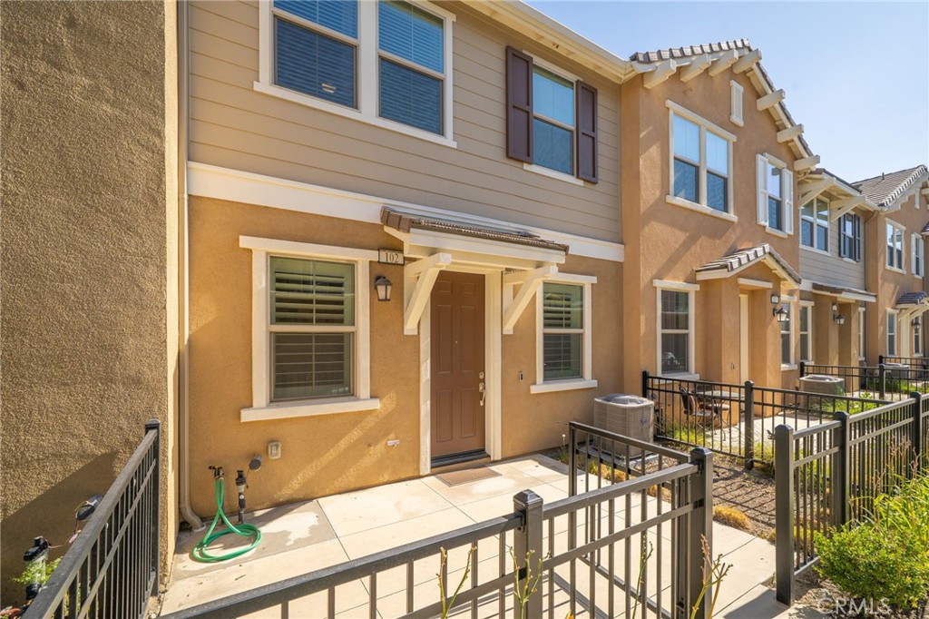 16502 Casa Grande Avenue, Unit 102 Fontana, CA 92336 - Photo 1 of 41 a view of a building with a window