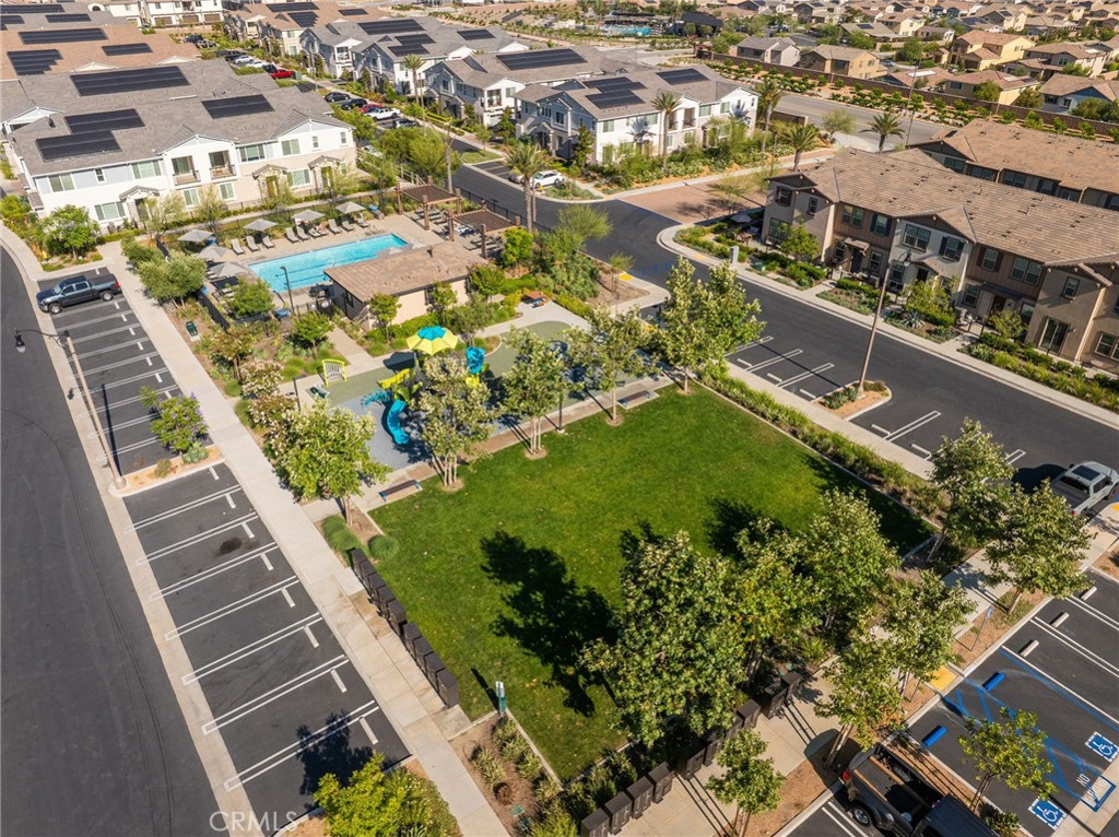 16502 Casa Grande Avenue, Unit 102 Fontana, CA 92336 - Photo 24 of 41 an aerial view of residential houses with outdoor space