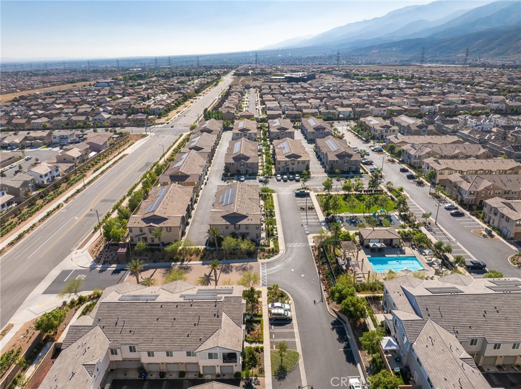 16502 Casa Grande Avenue, Unit 102 Fontana, CA 92336 - Photo 27 of 41 an aerial view of residential houses with outdoor space
