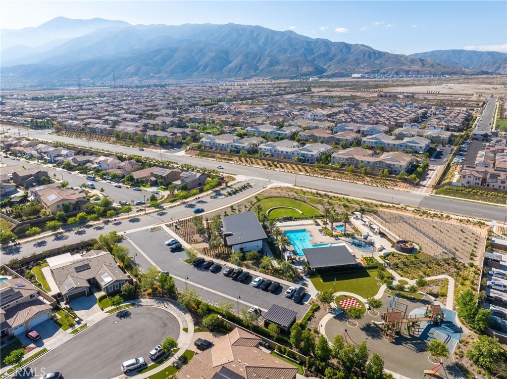 16502 Casa Grande Avenue, Unit 102 Fontana, CA 92336 - Photo 33 of 41 an aerial view of residential houses with outdoor space