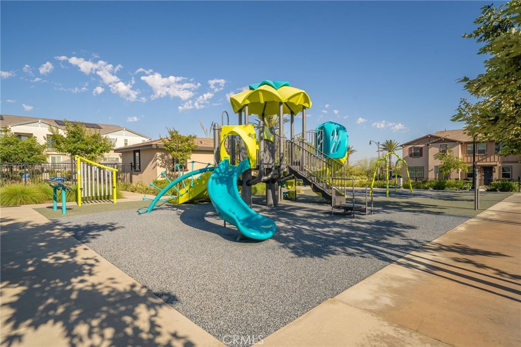 16502 Casa Grande Avenue, Unit 102 Fontana, CA 92336 - Photo 37 of 41 a view of a park with swings