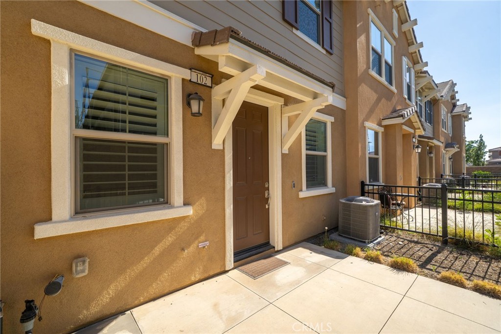 16502 Casa Grande Avenue, Unit 102 Fontana, CA 92336 - Photo 39 of 41 a view of a house with a large windows
