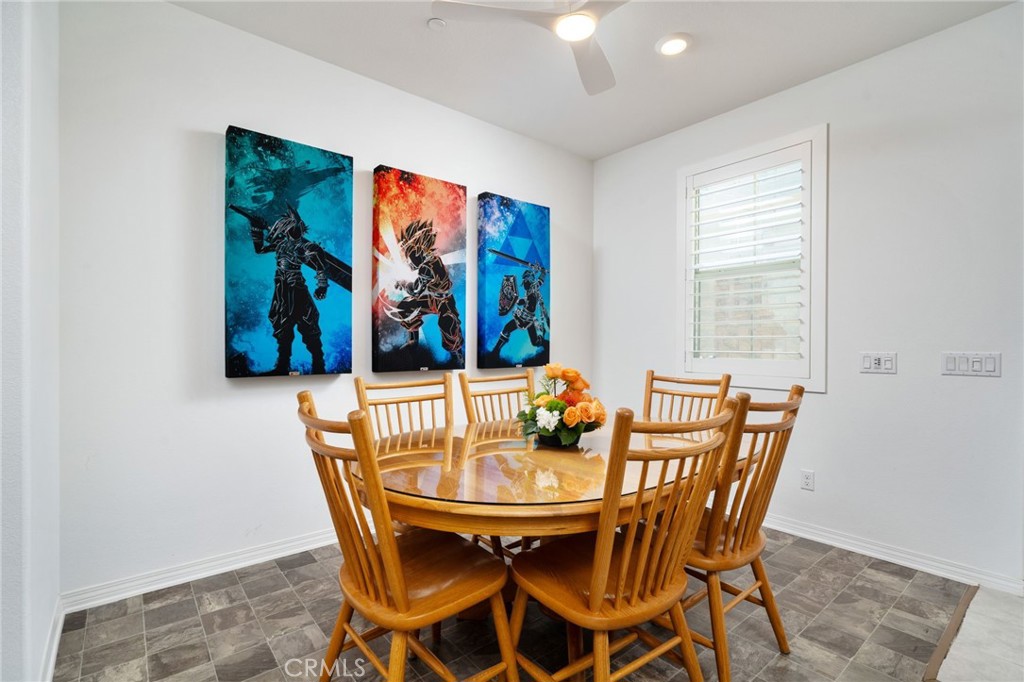 16502 Casa Grande Avenue, Unit 102 Fontana, CA 92336 - Photo 5 of 41 a view of a dining room with furniture and window