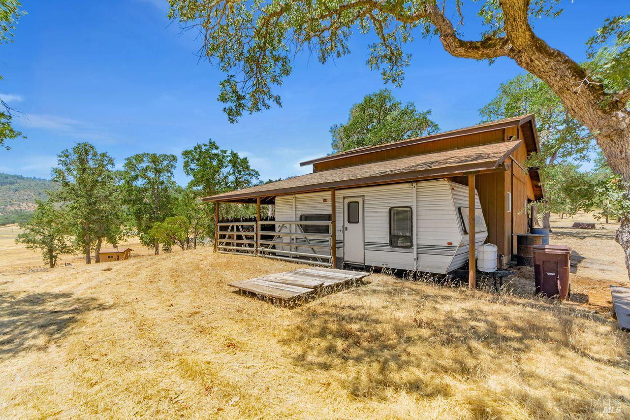 17277 Butts Canyon Road Middletown, CA 95461 - Photo 15 of 41 a view of a house with a yard