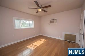 310 Union Street Carlstadt, NJ 07072 - Photo 15 of 24 a view of an empty room and a window