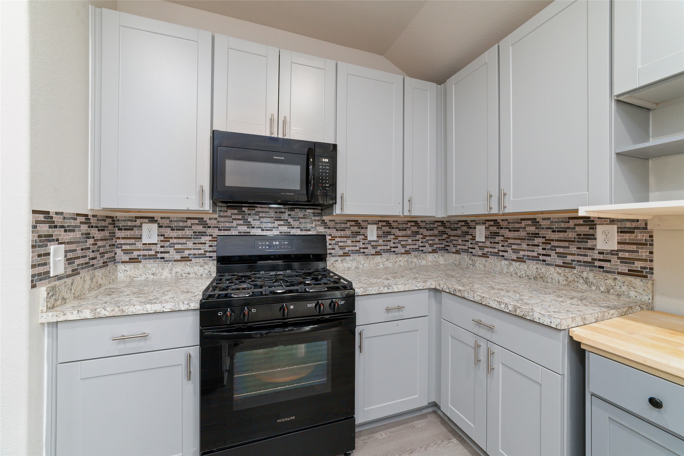 14232 Shasta Ridge Drive Conroe, TX 77303 - Photo 10 of 26 Well-designed kitchen with generous cabinet space and a clean, open feel, creating an easy flow for everyday living.