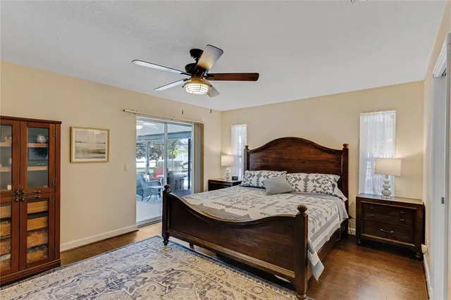 a view of walk in closet with clothes