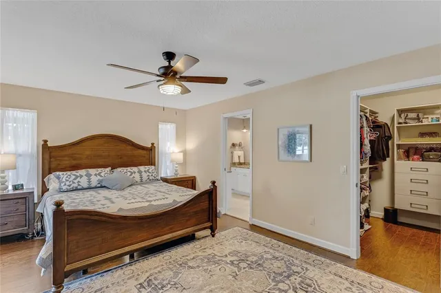 a bathroom with a toilet and shower