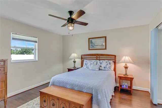 a bathroom with a sink a mirror and a toilet