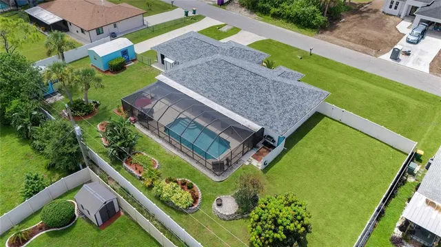an aerial view of a house with a garden