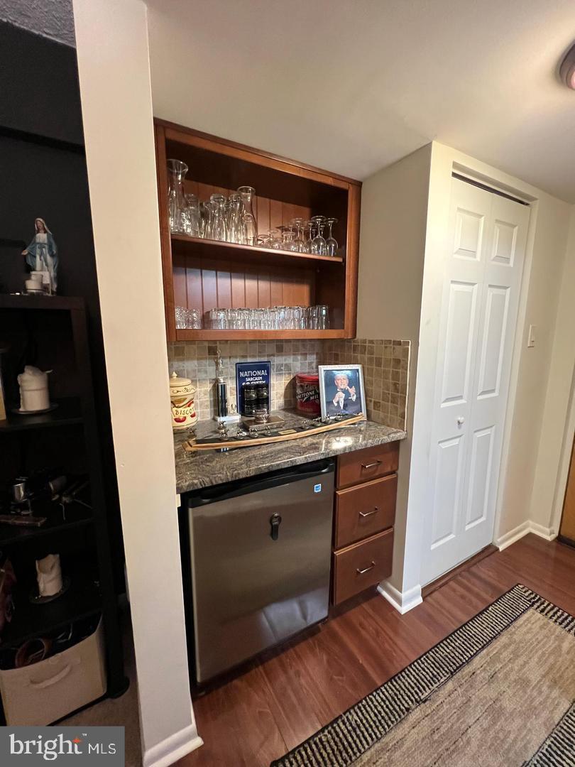 3304 Valley Drive, Unit 3304 West Chester, PA 19382 - Photo 7 of 18 a kitchen with stainless steel appliances granite countertop a refrigerator and a stove
