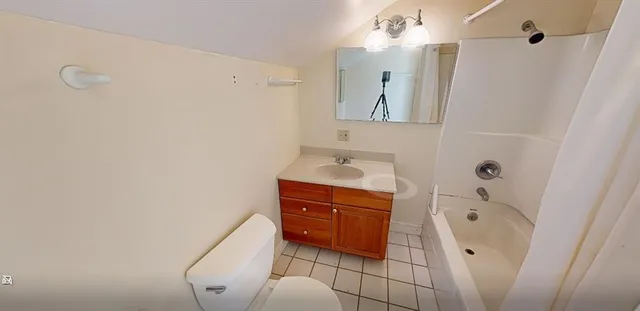 a bathroom with a sink a vanity and a mirror