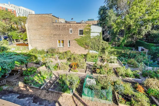a view of a car parked in front of a house