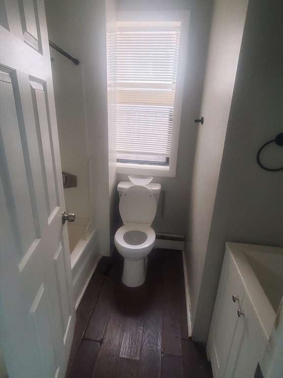 620 Dudley Street, Unit 4 Boston, MA 02125 - Photo 9 of 15 a bathroom with a toilet and a sink