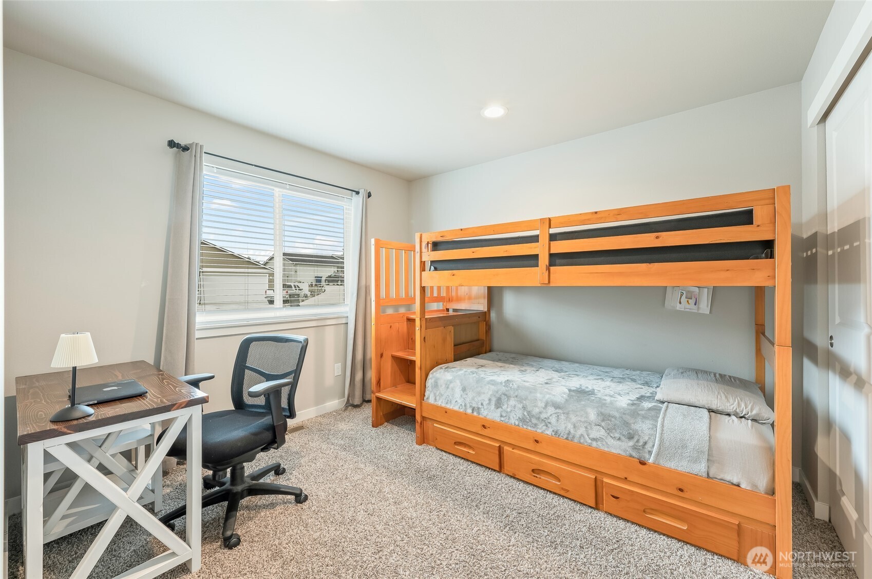 2205 Southeast Marlette Road East Wenatchee, WA 98802 - Photo 14 of 29 a bedroom with a bed and a desk
