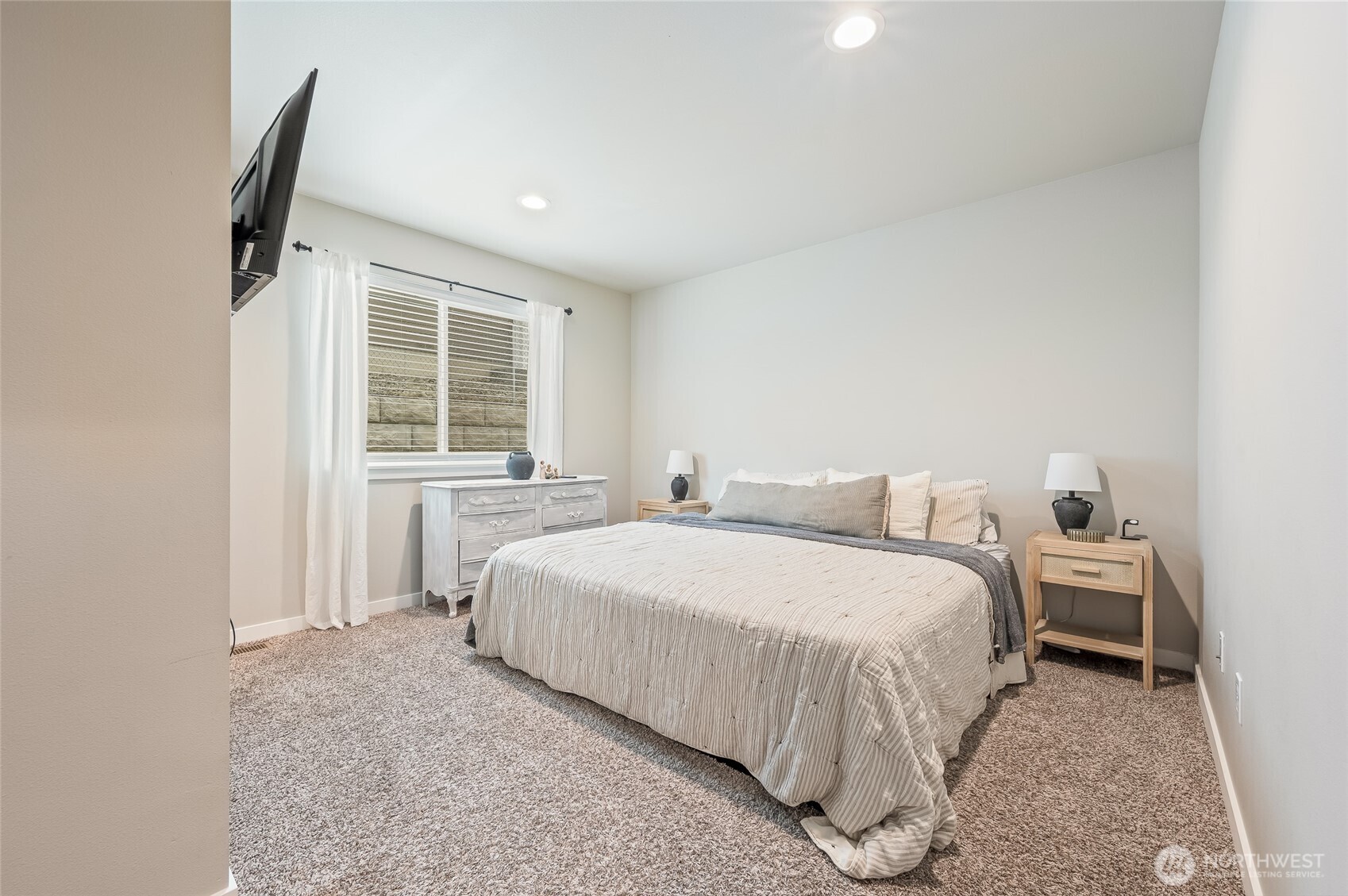 2205 Southeast Marlette Road East Wenatchee, WA 98802 - Photo 16 of 29 a bedroom with a bed and a window