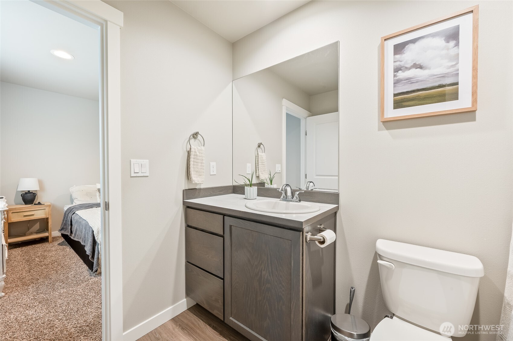 2205 Southeast Marlette Road East Wenatchee, WA 98802 - Photo 18 of 29 a en suite bathroom with a toilet sink and mirror