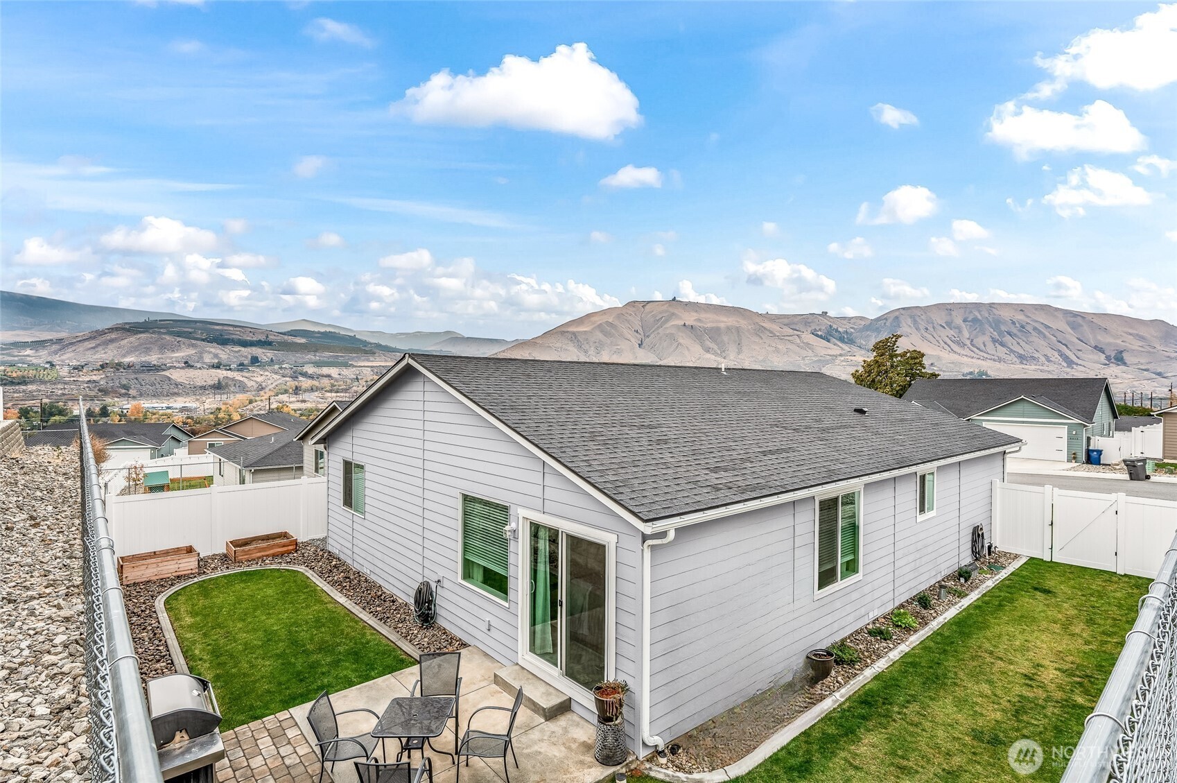 2205 Southeast Marlette Road East Wenatchee, WA 98802 - Photo 2 of 29 a aerial view of a house next to a yard
