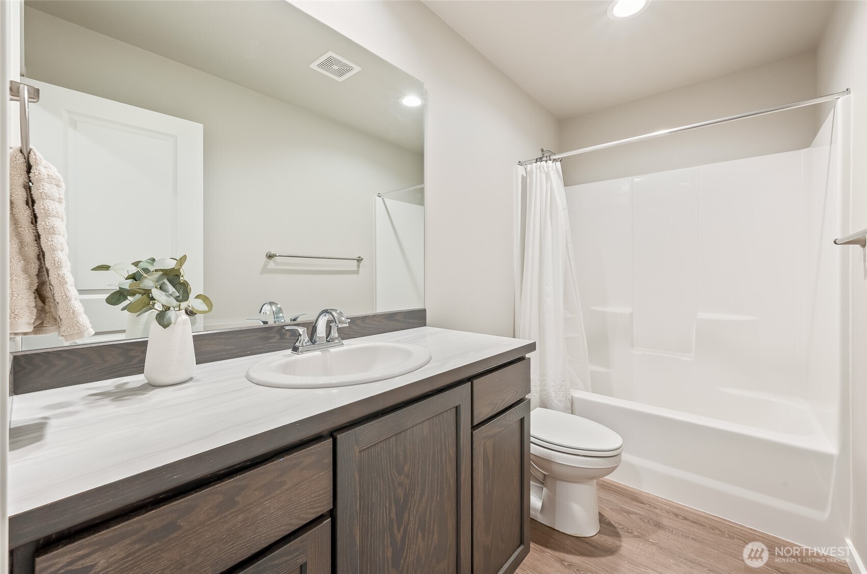 2205 Southeast Marlette Road East Wenatchee, WA 98802 - Photo 21 of 29 a bathroom with a sink a toilet and shower