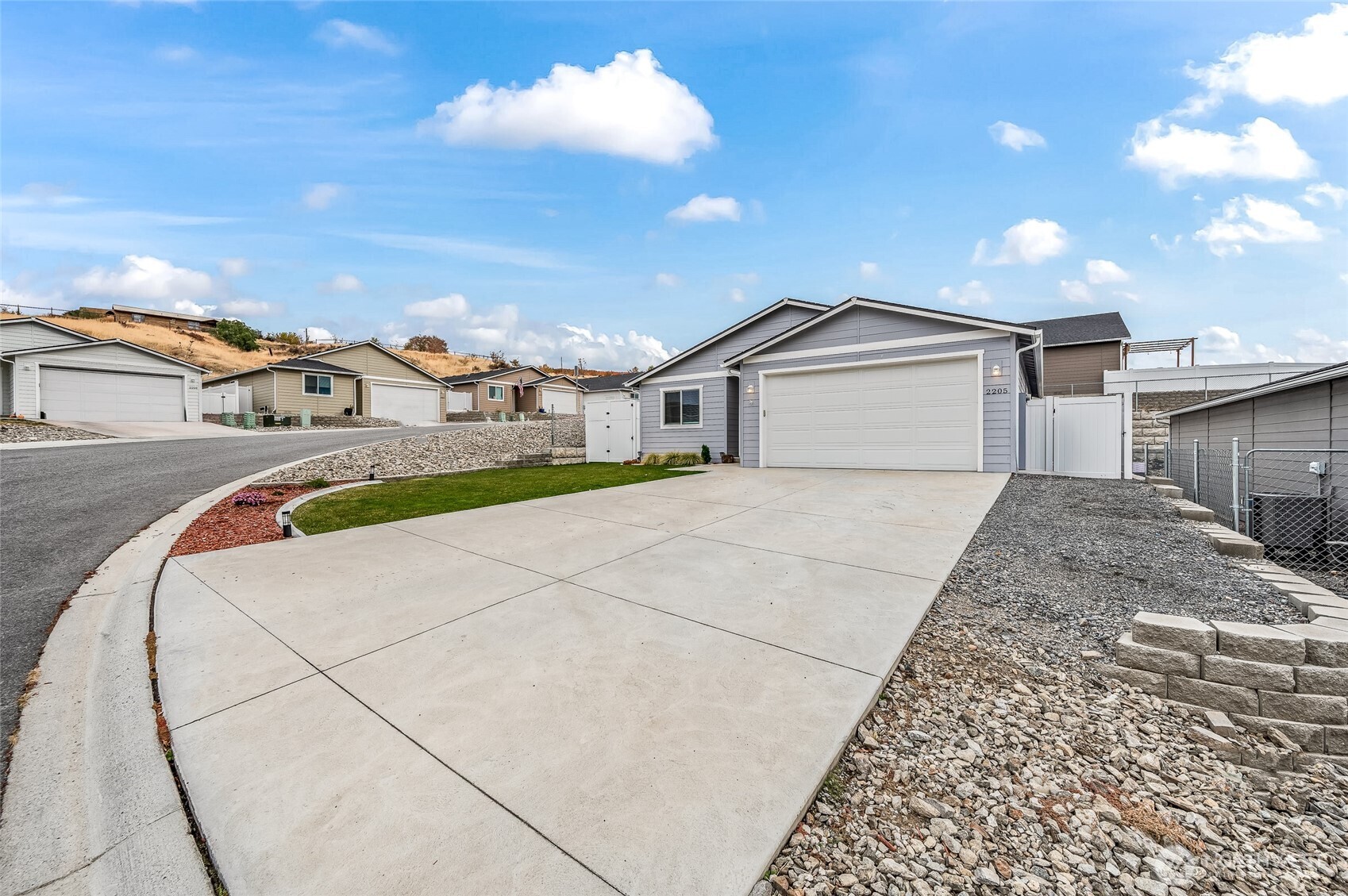 2205 Southeast Marlette Road East Wenatchee, WA 98802 - Photo 29 of 29 a view of a house with a dry yard in front of it