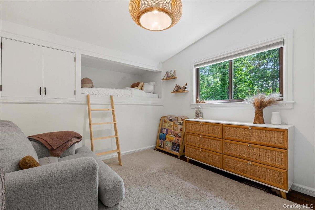 43 Winslow Road White Plains, NY 10606 - Photo 14 of 32 a bedroom with furniture and a window
